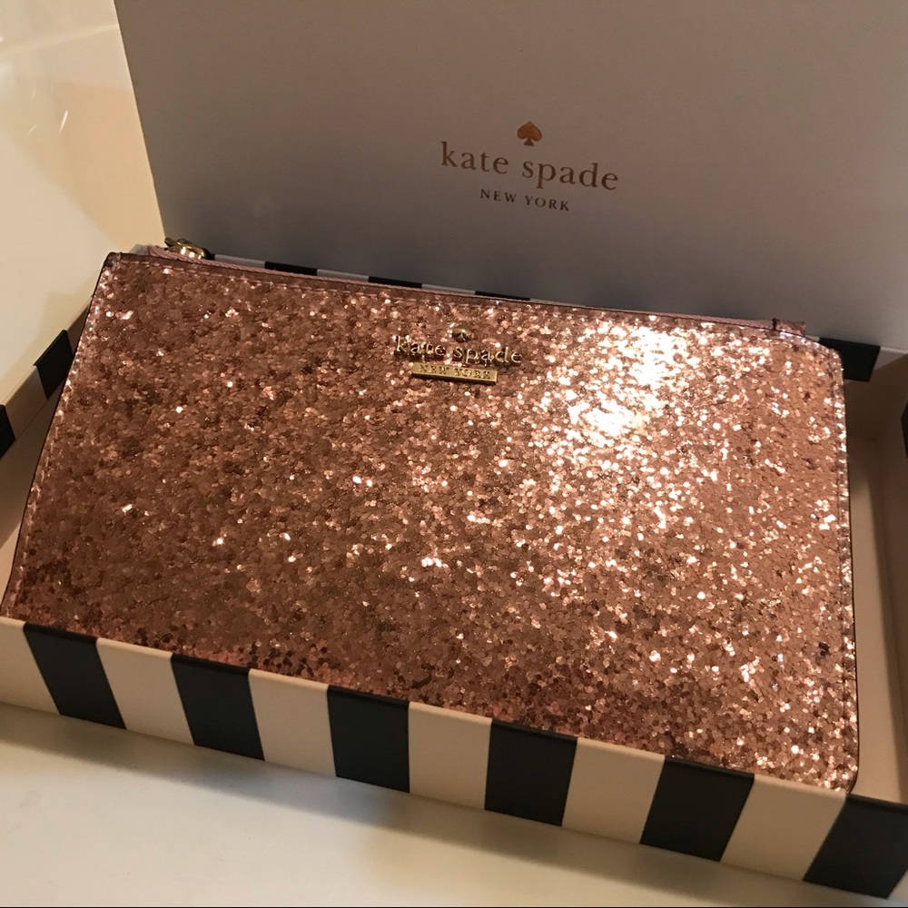 Kate Spade Clutch In Rose Gold, never worn!
